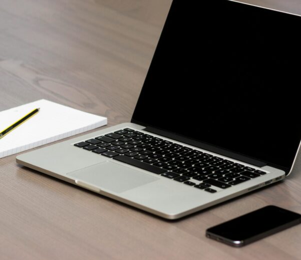 Free Silver Macbook Beside Iphone Stock Photo