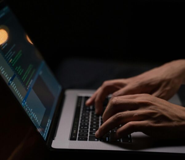 person-using-silver-and-black-laptop-computer