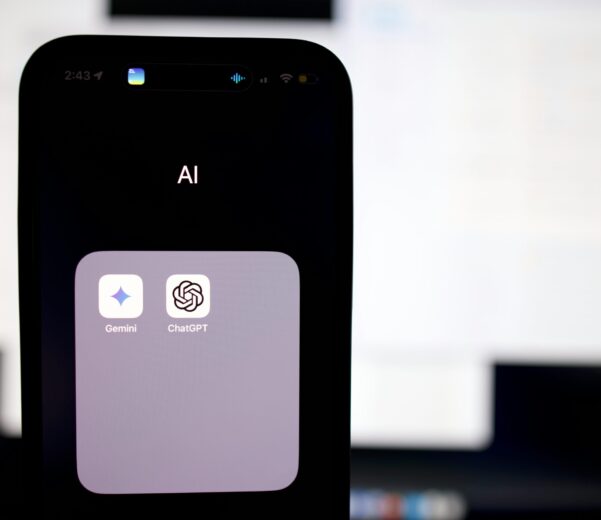 a close up of a cell phone with an ai button